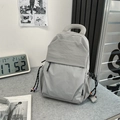 Sac à dos gris clair polyvalent avec poche à carreaux et tirettes de fermeture en corde - Sans pendentif / Gris