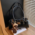 Retro black faux leather shoulder bag with gold hardware and brown knit bear charm - Black with Pendant