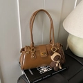 Chic brown glossy PU leather shoulder bag with a cute bear charm and golden hardware - Brown with Pendant