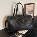 Schwarze Reisetasche mit großem Fassungsvermögen, mattem Finish und Schultergurt - Schwarz