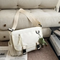 Waterproof off-white messenger bag with large flap, plastic buckles and a plush charm - With Charm / White
