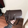 Dark brown faux leather crossbody bag with vintage texture and silver metal buckle - Brown