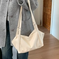 Creamy beige hobo shoulder bag with adjustable double straps and silver metal buckles - White