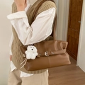 Retro dark brown pebbled leather tote bag for women featuring a plush bear charm - Brown