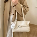 Cream white lychee leather tote bag with silver buckle and plush puppy charm - White