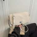 Bolso de axila de cuero crema francés con patrón de lichi y hebilla de metal plateado - Blanco