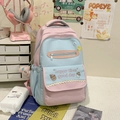 Detail van roze en blauwe Japanse schooltas met kanten rand en pluche hanger - Roze