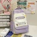 Detail of lavender school backpack with lace trim and cute happy time slogan print - Purple