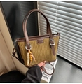 Olive green pleated bucket bag with brown leather trim and beaded charm detail - Green