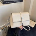 Minimalist cream shoulder bag with silver round clasp buckle and adjustable strap - Off-white