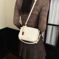 Creamy white lychee grain leather crossbody bag with vintage gold twist lock for women - Off-white