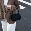 Retro black crossbody bag with litchi grain texture and gold hardware details - Black