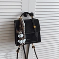 Retro black leather backpack with white stitching and a cute dog charm on a door - Black (With Pendant)