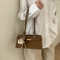Brown vintage underarm bag featuring a buckle strap and a cute plush bear charm - Brown with Pendant