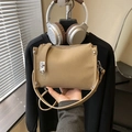 Khaki pebbled leather Boston bag with silver hardware and adjustable crossbody strap - Khaki