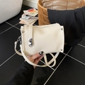 Creamy white lychee leather Boston bag with silver rivets and metal lock detail - White