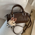 Dark brown faux leather barrel bag with a cute plush bear charm and adjustable shoulder strap - With Charm / Brown