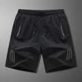 Herren schnelltrocknende Sportshorts in Schwarz mit Streifen und Reißverschlusstaschen - L / Schwarz