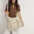 Large beige quilted nylon tote bag with utility pockets and wide shoulder strap - Off White