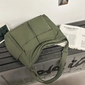 Olive green quilted tote bag with large utility pockets and wide shoulder straps - Green