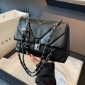 Elegant black quilted crossbody bag with silver V-stitch leather and chain strap - Black