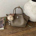 Khaki pebbled leather bucket bag with silver clasp and cute plush dog charm - Elephant Gray with Charm