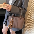 Vintage brown leather bucket bag with wooden bead charm and contrast stitching detail - Coffee with Pendant