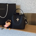 Classic black litchi pattern leather bucket bag with silver lock and puppy charm - Black