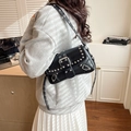 Black punk style baguette bag with silver rivets and metal buckle detail for women - Black