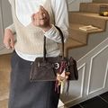Vintage dark brown suede pillow handbag for women with bear charm and tassel detail - With Charm / Brown