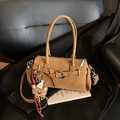 Brown faux leather vintage pillow bag with crossbody strap and plush bear charm - With Charm / Brown