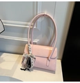 Pink glossy shoulder bag with bow charm and embossed lettering in a stylish design - Pink (With Charm)