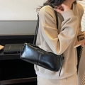 Bolso baguette negro brillante con lazo y finas correas de cuero elegante - Negro