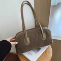 Brown faux shearling shoulder bag with deep brown leather handles on wooden stool - Dark Khaki