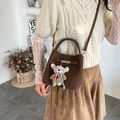 Borsa a secchiello in pelle martellata testa di moro con chiusura argento e charm orsetto - Marrone Cacao (Con Ciondolo)