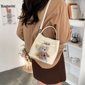 Elegante borsa a secchiello beige con ciondolo a orsetto e fibbia in metallo da donna - Bianco Sporco (Con Ciondolo)