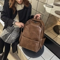 Classic dark brown vintage PU leather backpack with a spacious main compartment - Yellow Brown