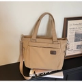 Große khakifarbene Nylon-Einkaufstasche mit verstellbarem Riemen und Vordertasche - Khaki