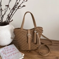 Brown woven bucket bag with elegant tassels and detachable strap for daily commute - Brown