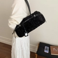 Elegant black faux shearling tote bag with leather straps and silver buckle detail - Black