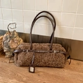 Brown fleece shoulder bag with faux leather straps and vintage faux shearling texture - Brown