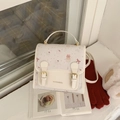 Elegante bolso beige con estampado de gato solapa ondulada y acabado de alta calidad - Blanco Roto