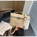 Chic cream ostrich texture mini vanity bag with silver zippers and top handle - Off White