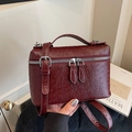 Retro dark red box bag with ostrich leather texture and silver hardware accents - Red