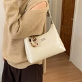 Chic off-white quilted chain bag for women with decorative beads and metal clasp - With Charm / Off White