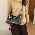 Black quilted faux leather shoulder bag with silver chain and cute cartoon charms - With Charm / Black