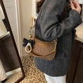 Brown monogram shoulder bag with chain strap and pearl bow charm in retro style - Brown