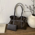 Detail of dark brown suede tote bag with MUHETI logo and silver metal buckle hardware - Brown