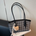 Fashionable dark grey checkered large tote bag with a cute plush bear charm hanging on it - Black