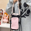 Borsa a tracolla per cellulare in nero e rosa con coulisse e cinturino regolabile - Con Ciondolo a Mela Rossa in Peluche / Rosa